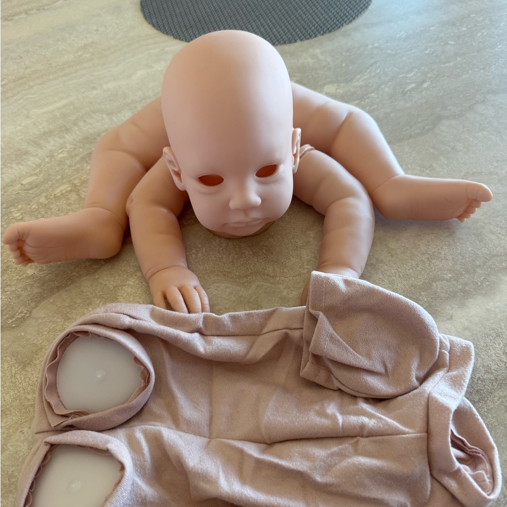 Realistic Baby Doll with Soft Pink Blanket
